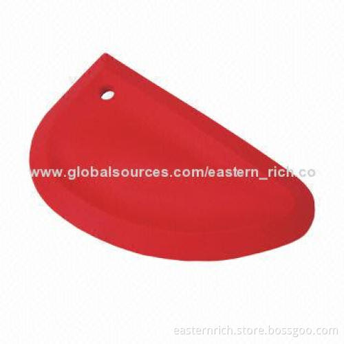 Silicone bowl scraper, measures 17x10x1cm
